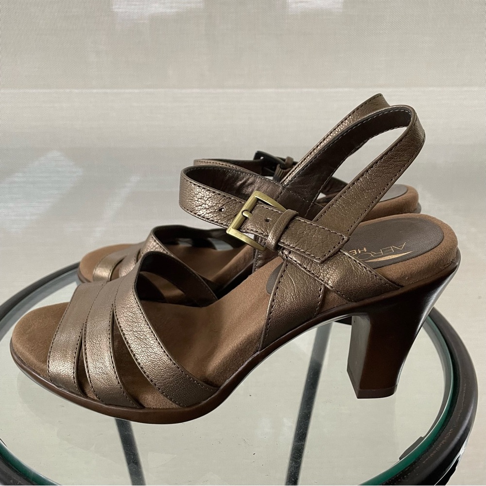 Like new Aerosoles metallic bronze heels in size 7.